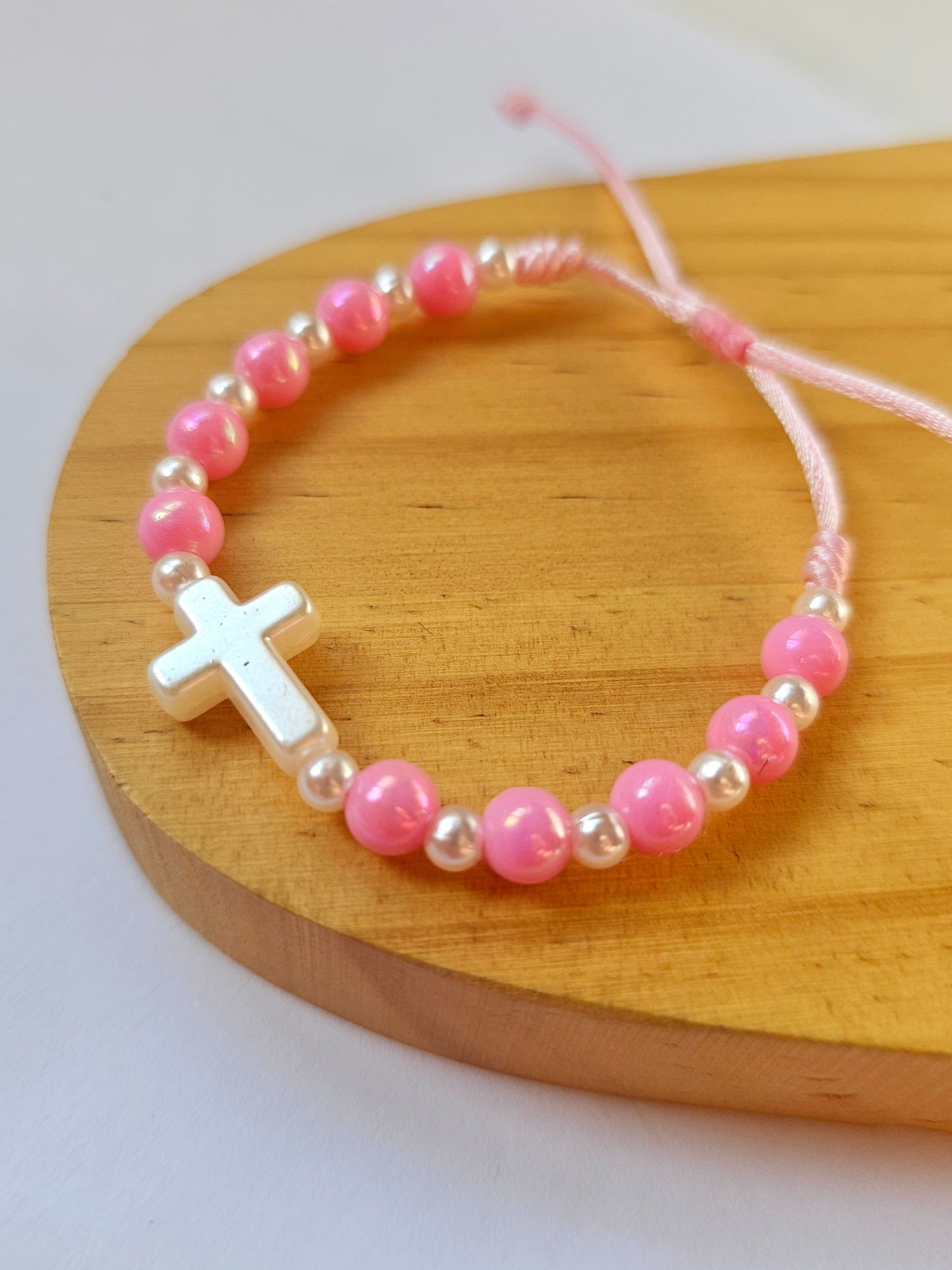 Pulseira Rosa com Cruz